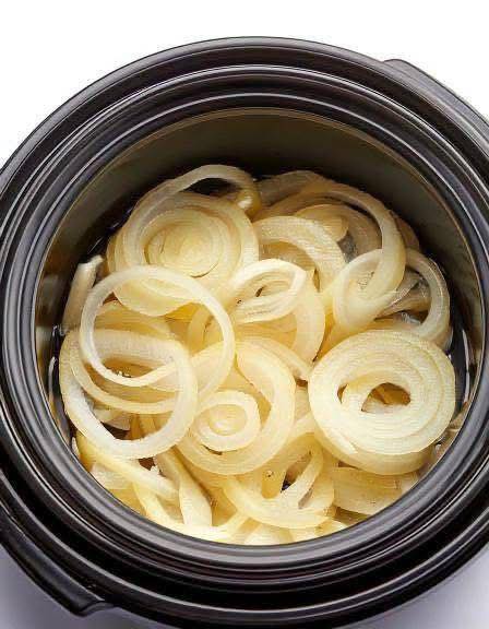 Put raw sliced onions in a slow cooker with these 2 ingredients. Dinner doesn’t get easier.. Full recipe 👇 💬