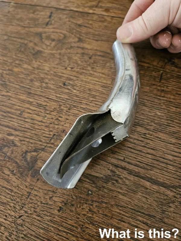 My father gave me this tool, saying I might need it someday. I can’t figure out what it’s used for… and he laughs every time I ask him. The handle is hollow. Check the first comment for the answer