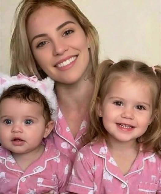 Young woman puts both daughters inside the .. See more