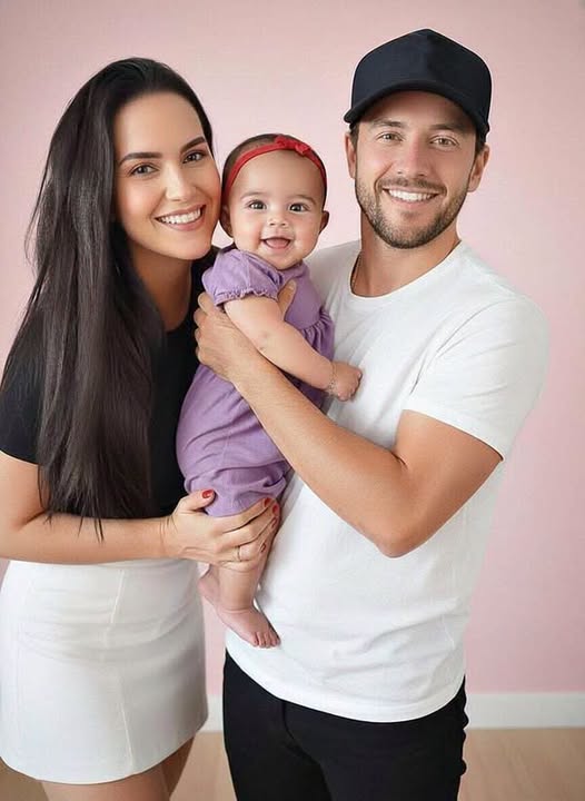 Young couple put daughter inside the fir… See more